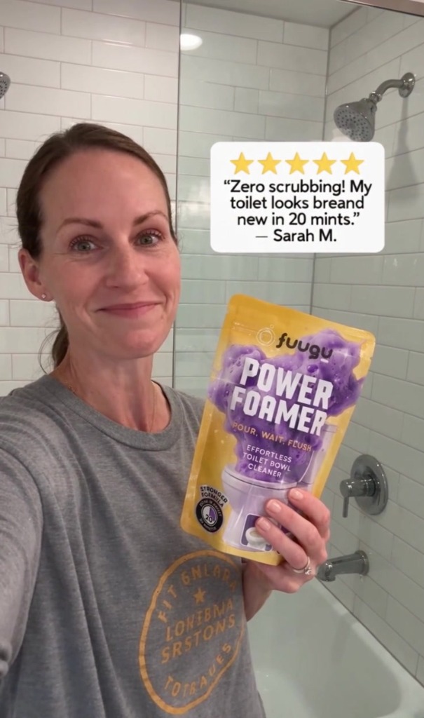 Holding a Fuugu Power Foamer single-use sachet in hand